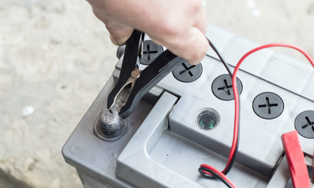 negative crocodile clamp connecting to a car battery