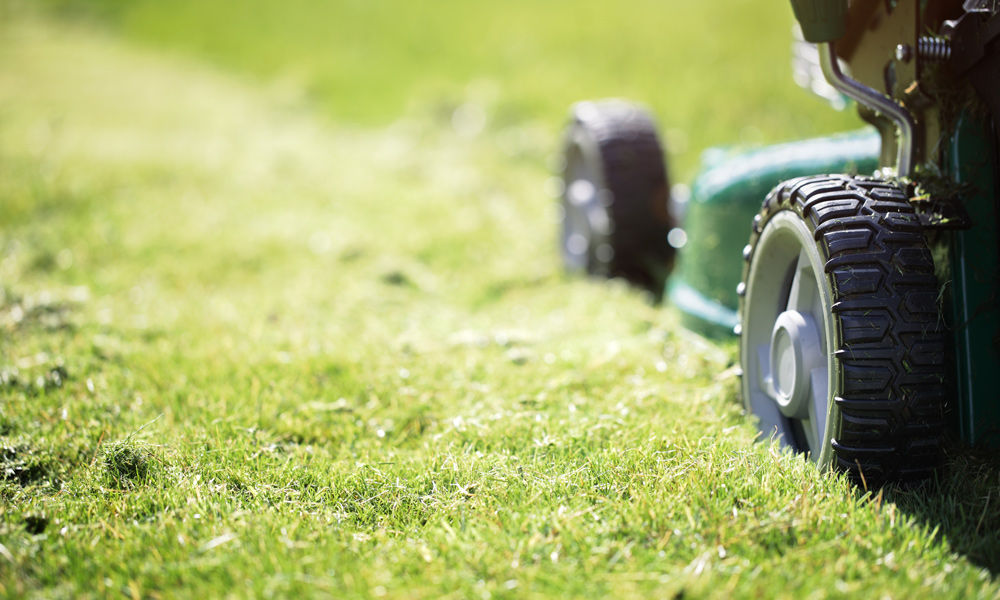 close up of a lawn mower wheels