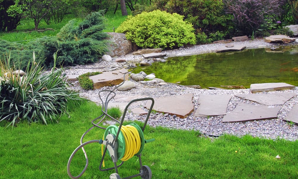 Hose Reel sitting in a garden