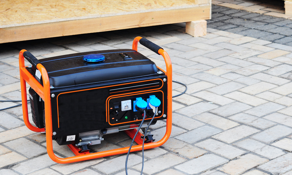 portable generator on blocking paving