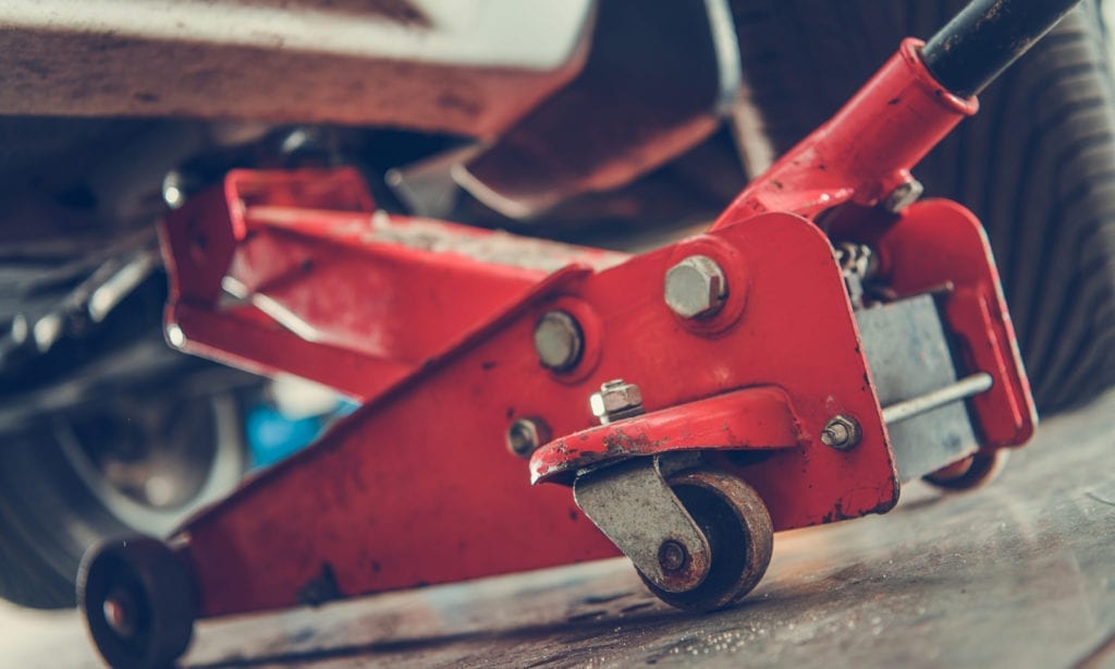 close up of a floor jack