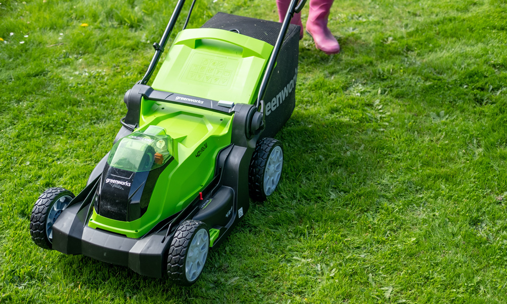 Greenworks lawn mower on grass