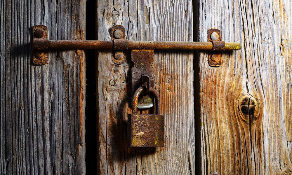 rusty bolt with padlock