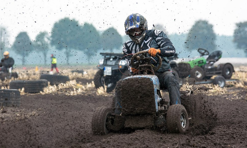 A racing lawn mower in mud