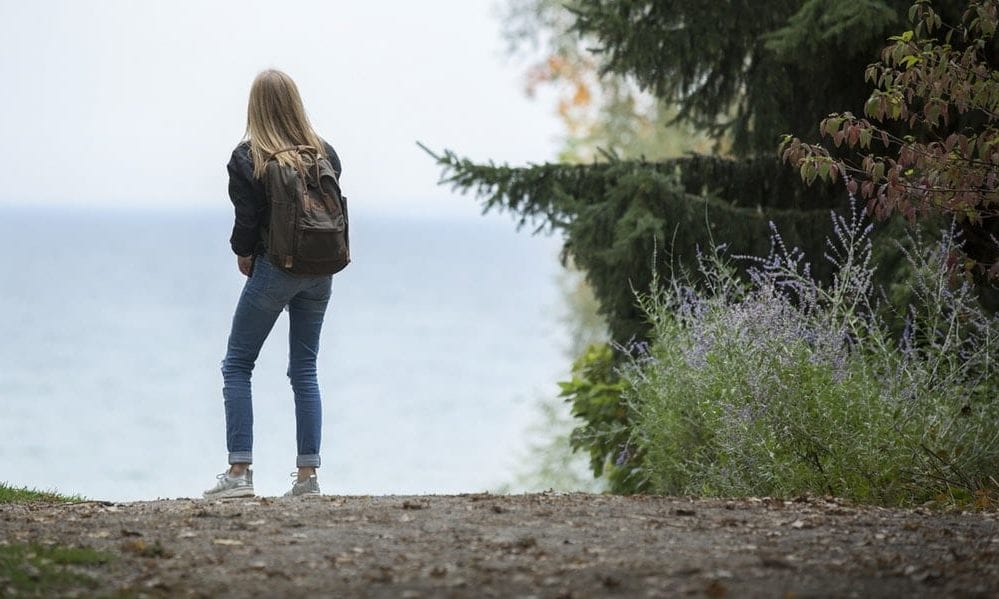 a women looking at the ocean view