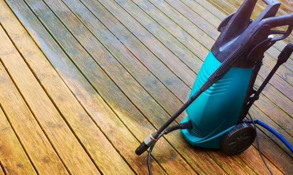 pressure washer sitting on decking