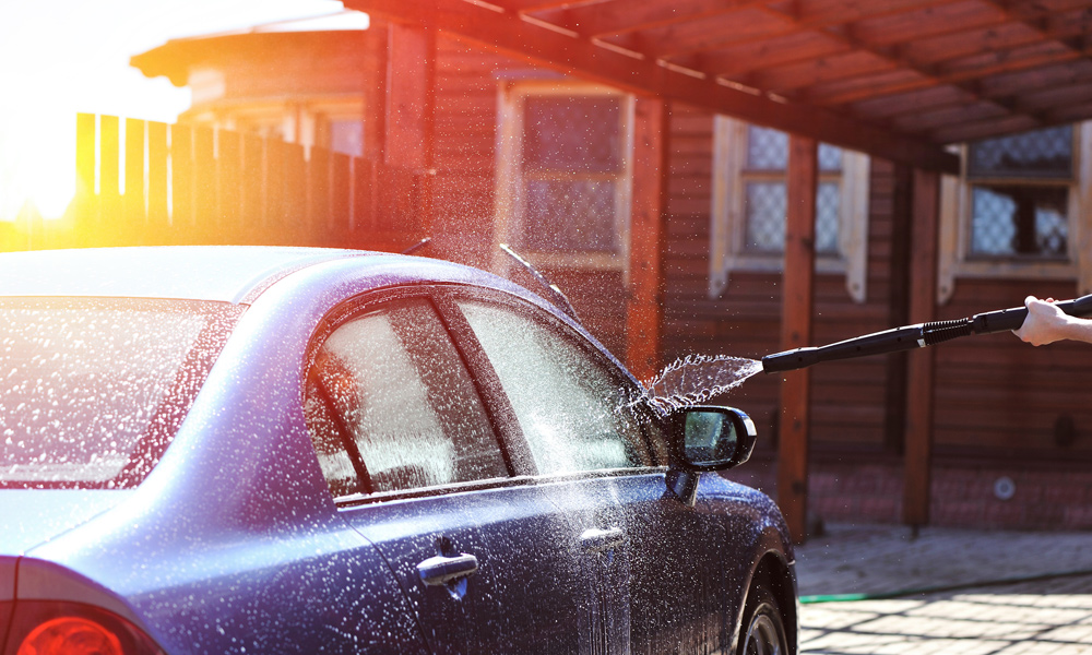 pressure washer cleaning a car 