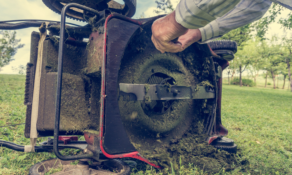 Lawn mower on its side