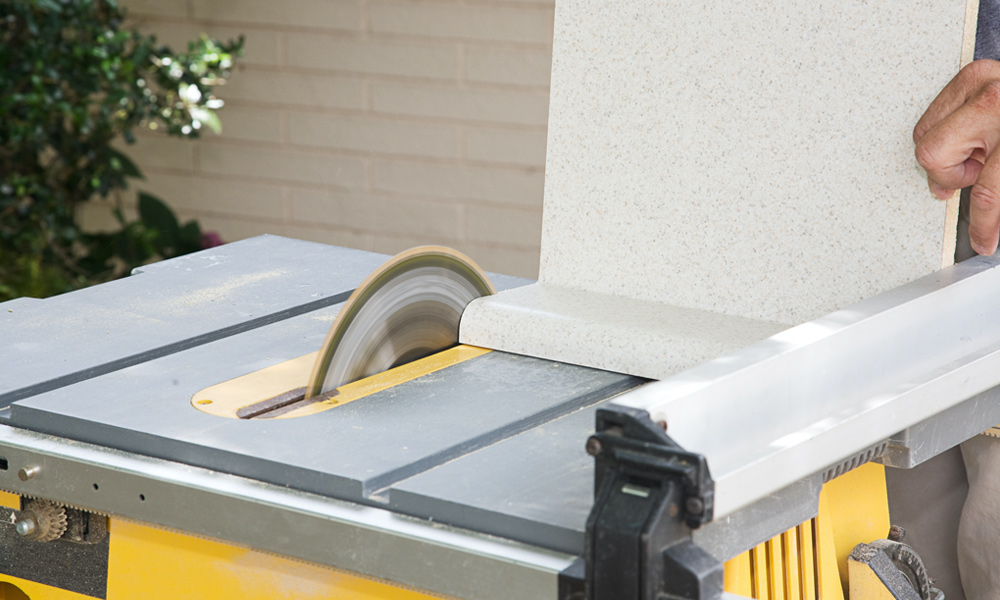 table saw cutting wood