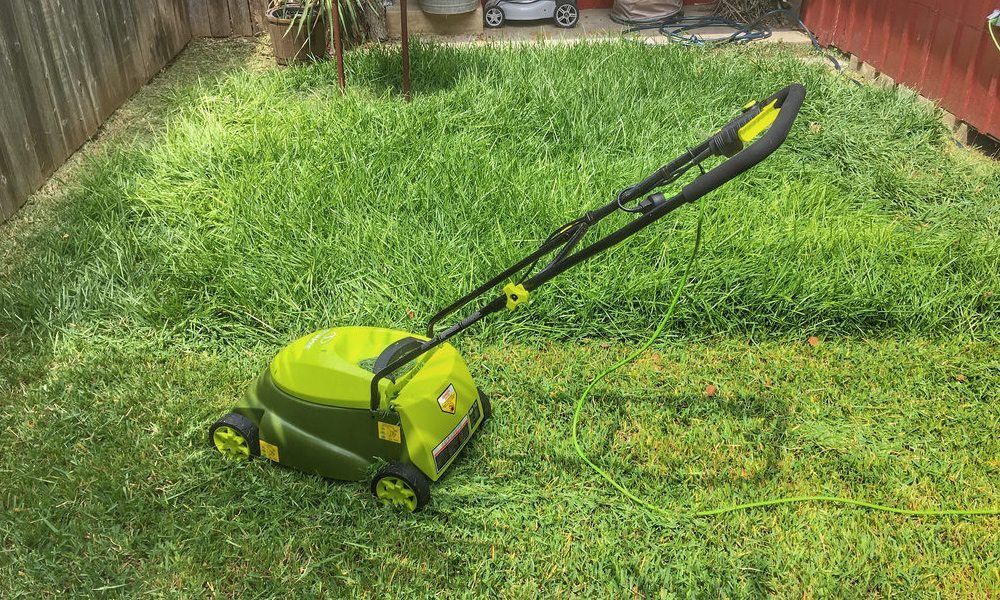 lawn mower in long grass