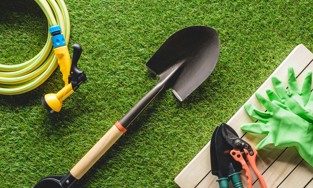 garden tools on a lawn 