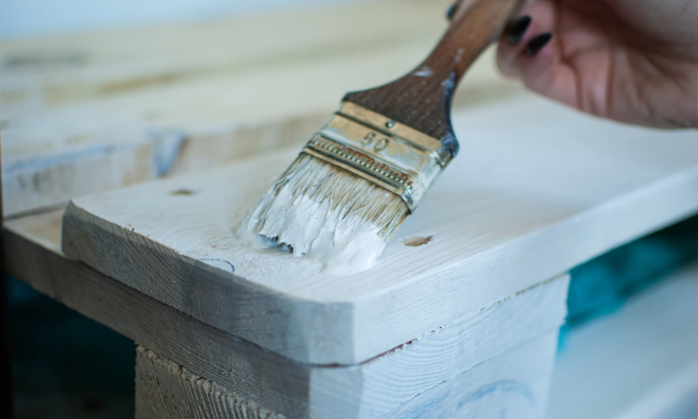 paint brush painting a pallet