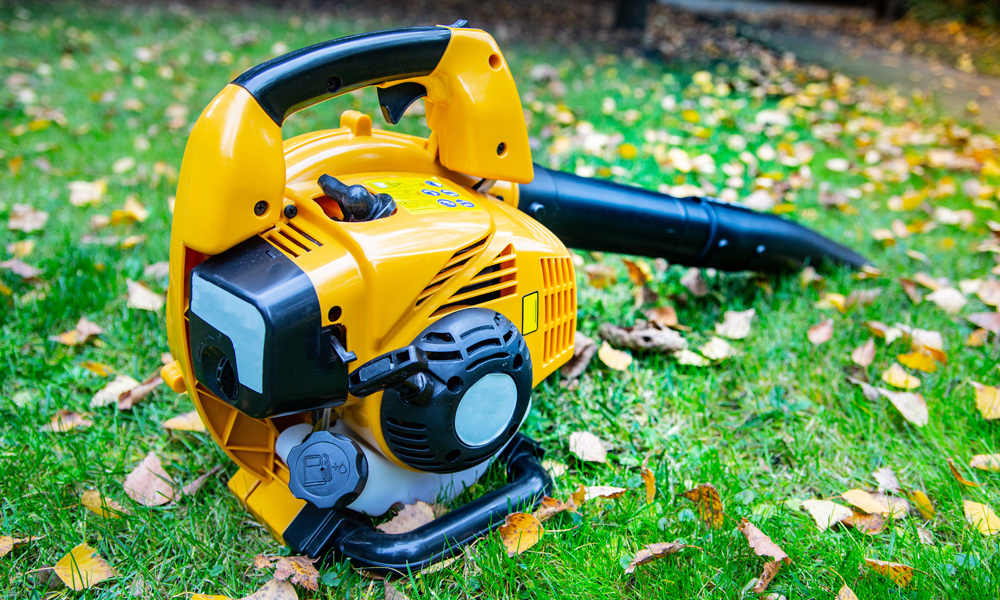 yellow leaf blower on the ground